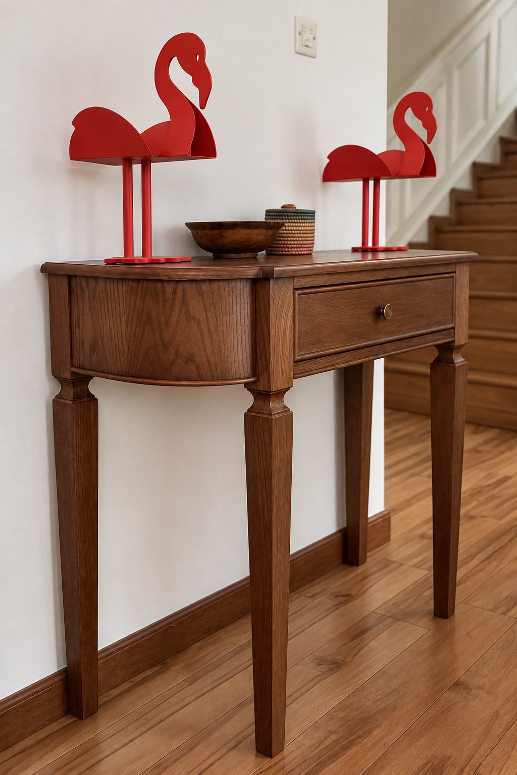 Side view of the console showing its curved end, drawer and legs